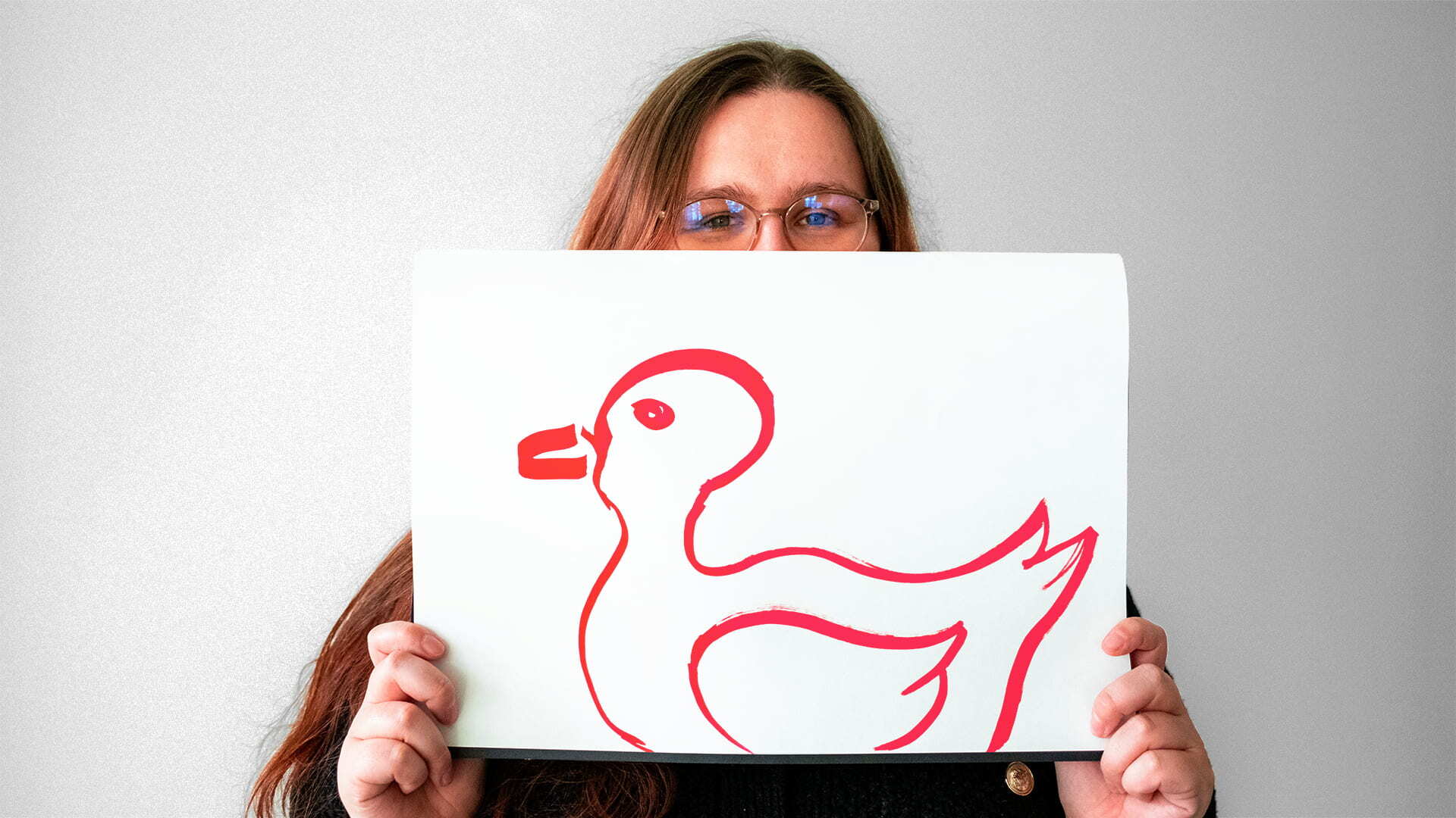 A little boy with ducks on his shirt